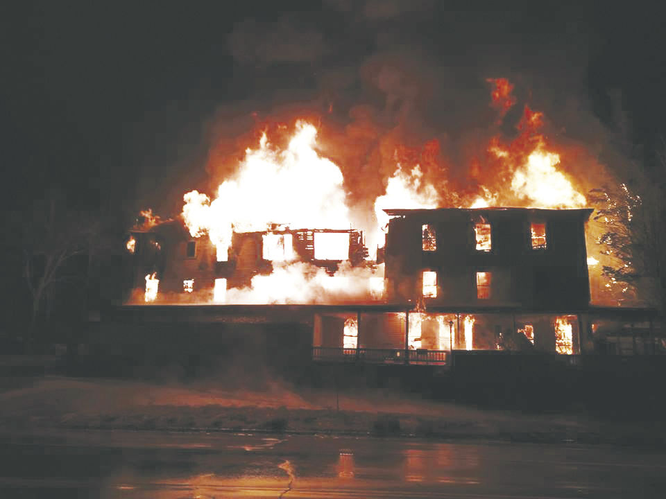 Arrest made in fire at abandoned Carroll hotel